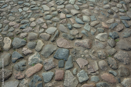 old bricks lined with granite stones