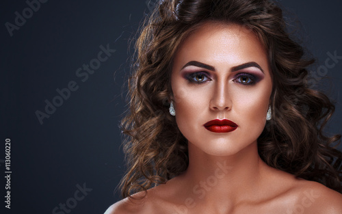 Portrait of Young beautiful woman with professional makeup