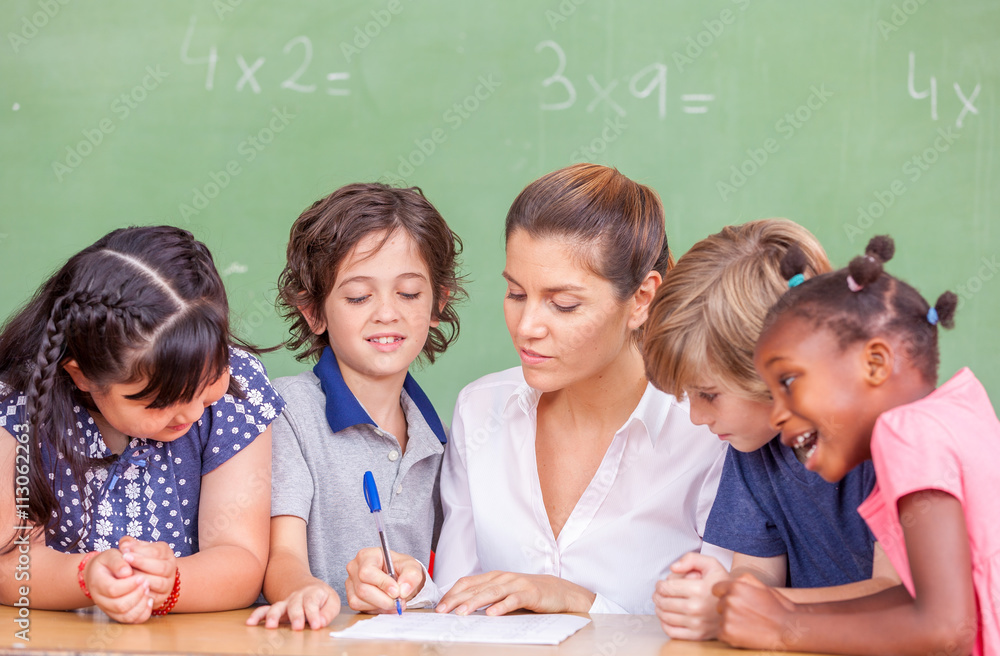 Beautiful teacher with mixed race classroom Beautiful teacher with mixed race classroom