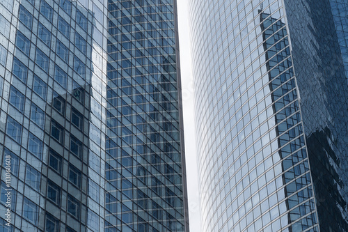 Skyscrapers with glass facade. Modern buildings in Paris business district. Concepts of economics, financial, future. Copy space for text. Dynamic composition.