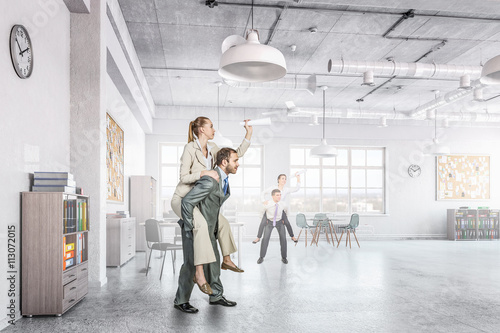 Business people having break in office © Sergey Nivens