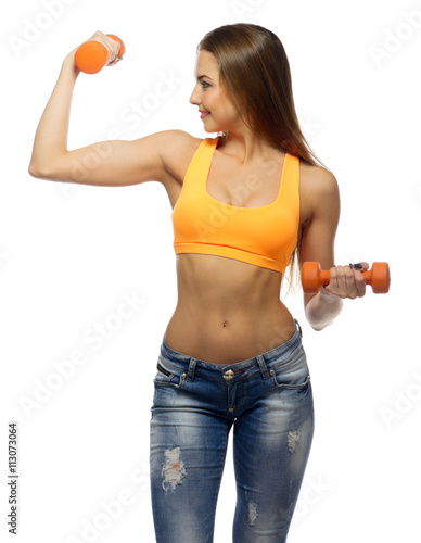 Young sporty girl with dumbbells