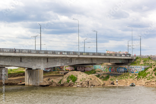 Kazan, Kremlin - June 06, 2015: Fishing and arts under on of the Kazan's bridge.