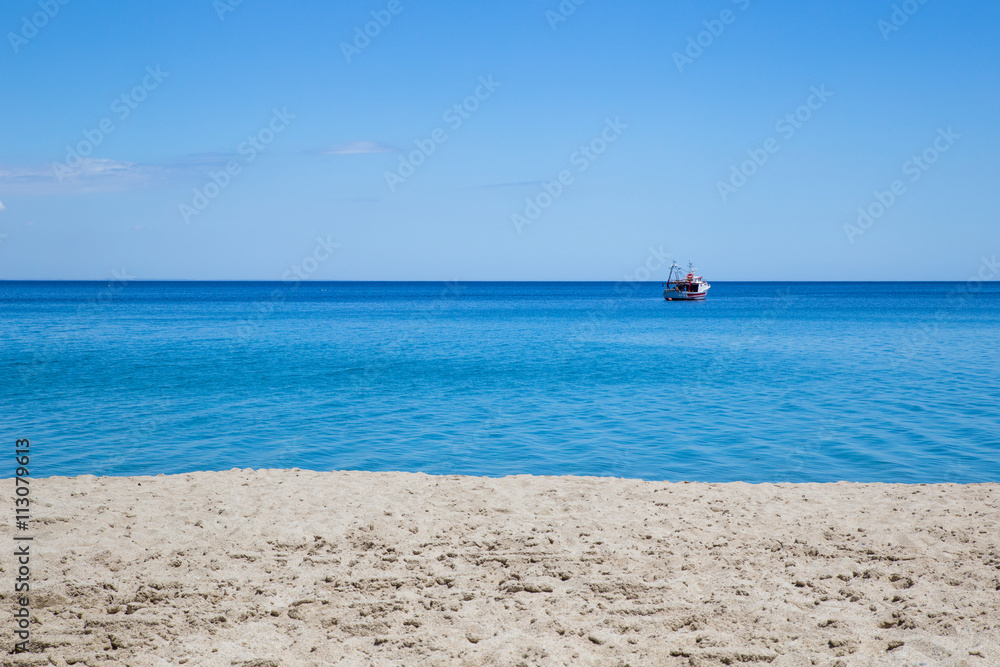 sandy beach and blue sea