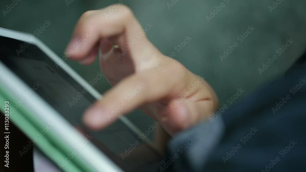 Woman use mobile device while relaxing on a sofa. Woman use mobile device while relaxing on a sofa.