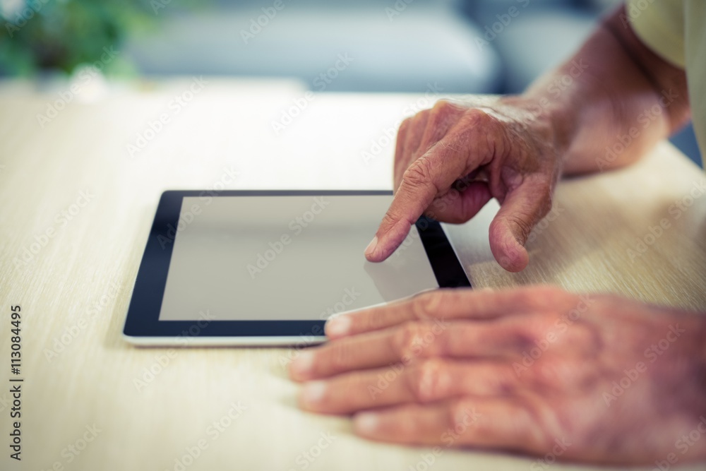 Senior man using digital tablet Senior man using digital tablet