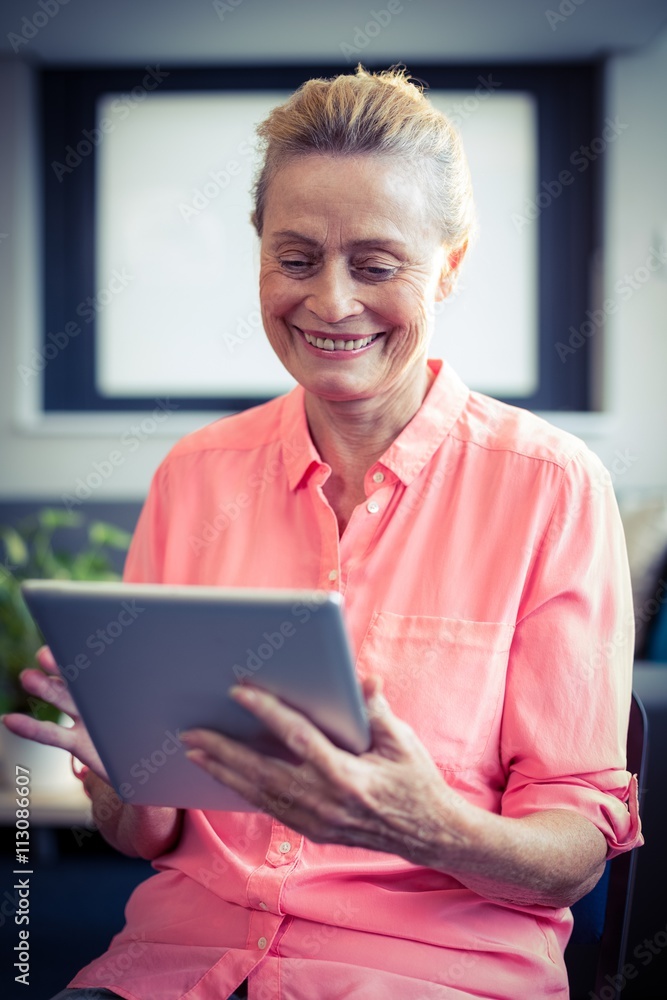 Senior woman using digital tablet Senior woman using digital tablet