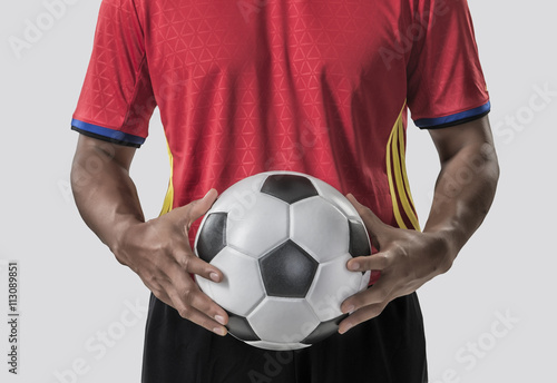 Portrait of soccer player. Isolated on white