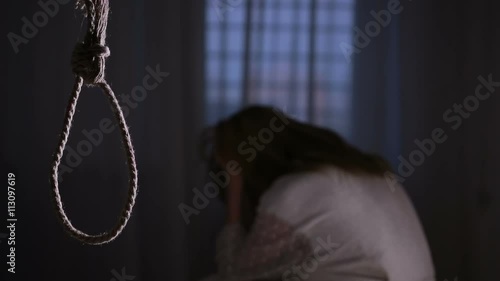suicide. Girl on the background of the loop for the neck.