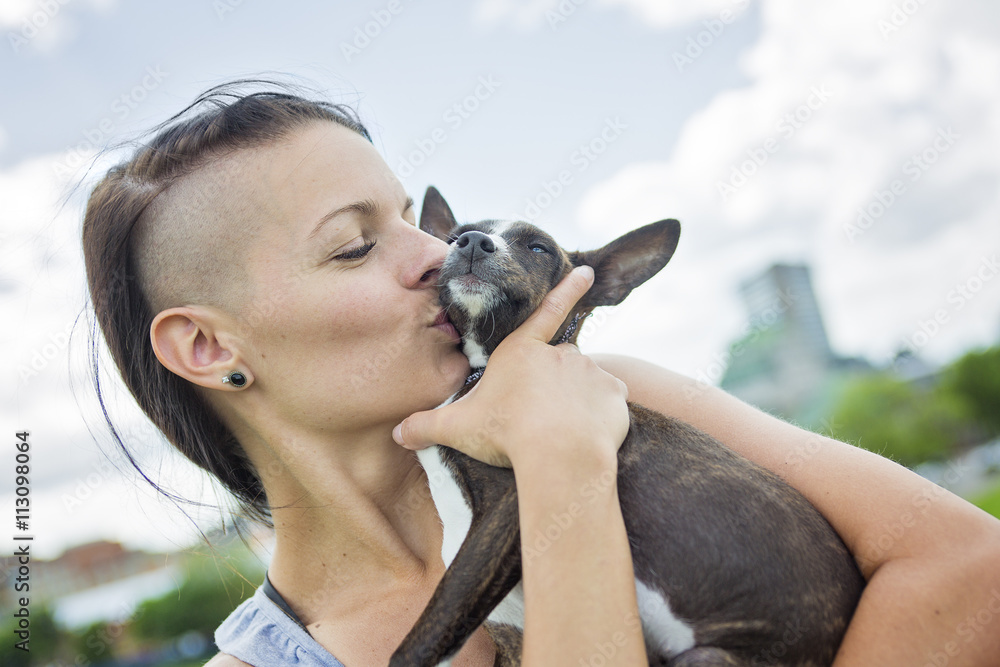 Obraz premium girl with a dog in the park