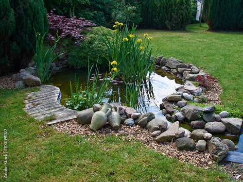 Beautiful classical garden fish pond gardening background