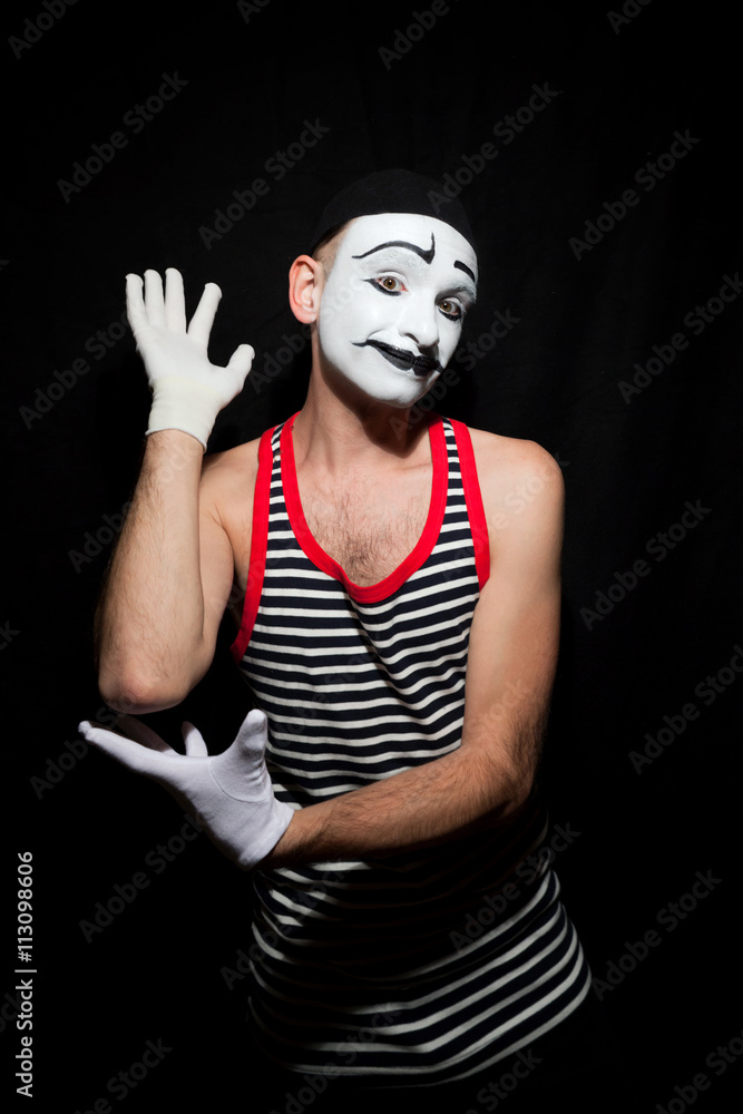 Portrait of sad mime wearing hat on black background Portrait of sad mime wearing hat on black background