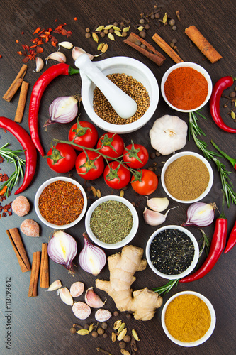 uncooked ingredients for preparing classic Italian food - pasta with sauce