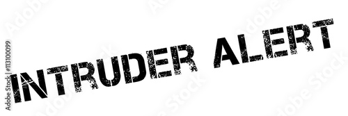 Intruder Alert black stamp on white photo