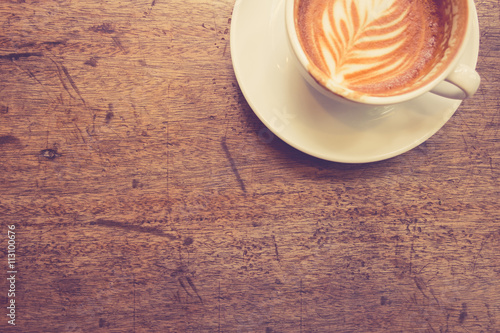 Coffee on wood background vintage color (Focus at wood backgroun
