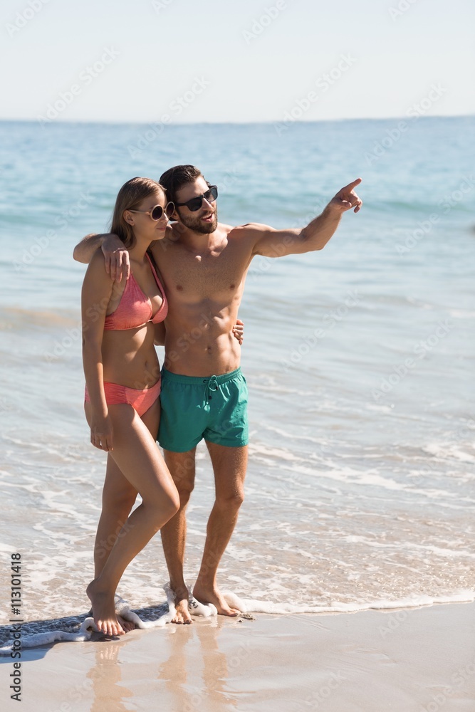 Couple embracing on beach Couple embracing on beach