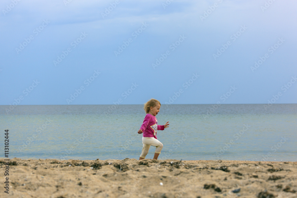 Girl runs on sand Girl runs on sand
