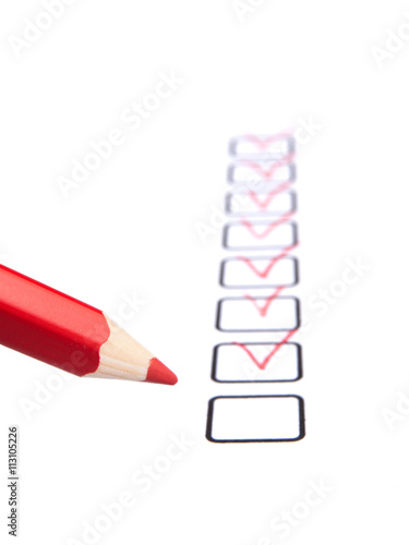 Checklist with red pencil