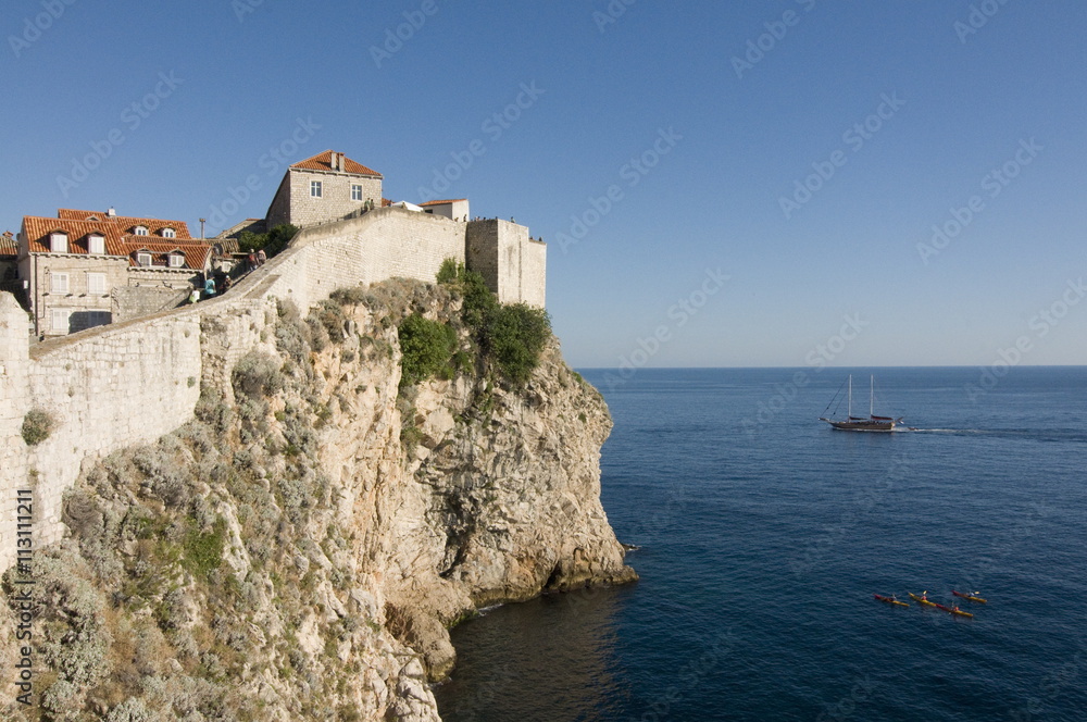 The city wall of Dubrovnik above the Mediterranean Sea, Croatia The city wall of Dubrovnik above the Mediterranean Sea, Croatia