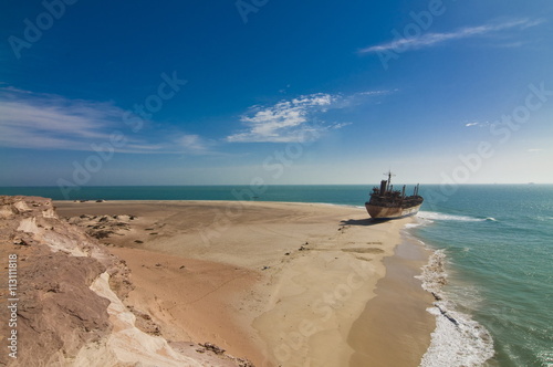 Stranded vessel at a beach of Cap Blanc, Nouadhibou, Mauritania photo