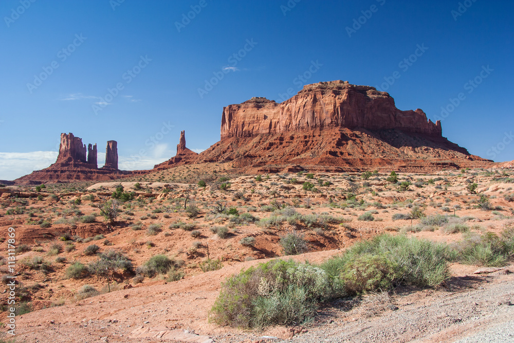 View of Monument Valley in Navajo Nation Reservation between Utah and Arizona View of Monument Valley in Navajo Nation Reservation between Utah and Arizona