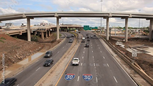 Traffic on a highway intersection near Dallas downtown. Texas, United States