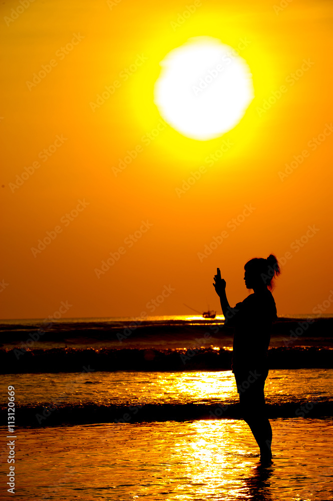Fototapeta premium Silhouette of a photographer