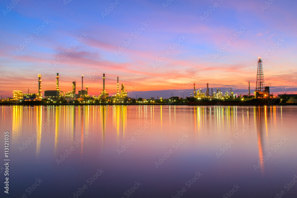 Oil refinery along the river at sunrise time (Bangkok, Thailand)