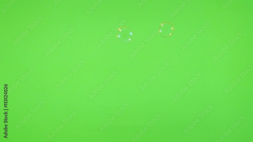 Soap bubbles flowing in front of greenscreen 4K 2160p 30fps UltraHD footage - Bubbles made of soap in the air green screen 4K 3840X2160 UHD video Soap bubbles flowing in front of greenscreen 4K 2160p 30fps UltraHD footage - Bubbles made of soap in the air green screen 4K 3840X2160 UHD video
