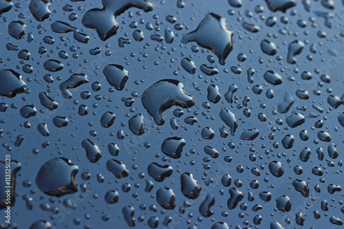  Water drops on a blue metal surface  © gojalia