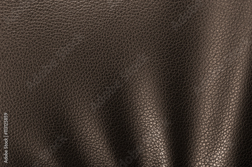 Closeup dark brown leather texture. leather background. and leather surface. for design with copy space for text or image.