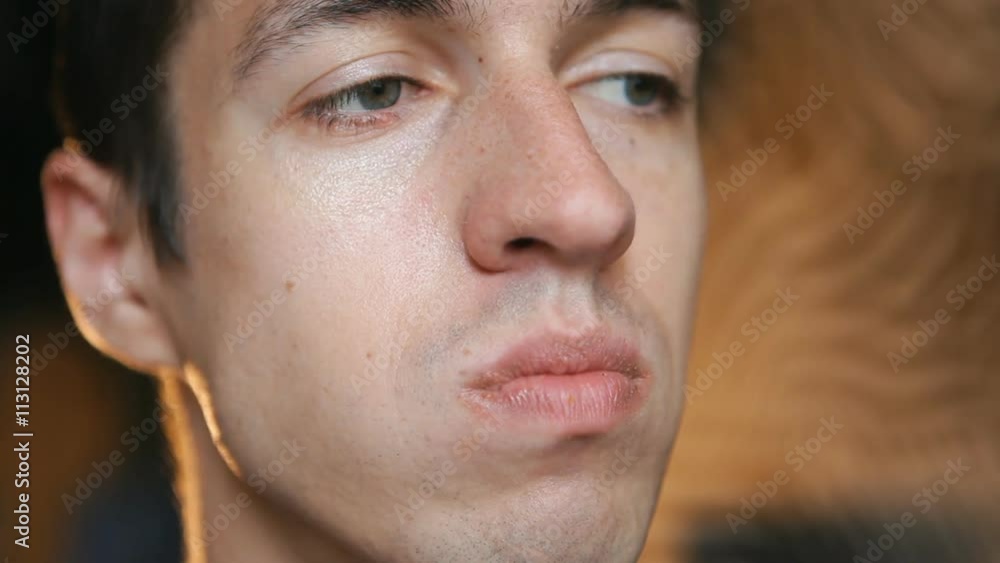Close up shot of man eating potato chips Close up shot of man eating potato chips