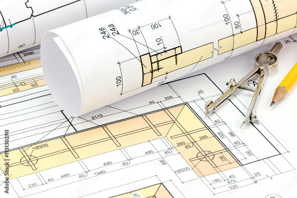 architectural blueprint rolls with plan and drawing compass architectural blueprint rolls with plan and drawing compass