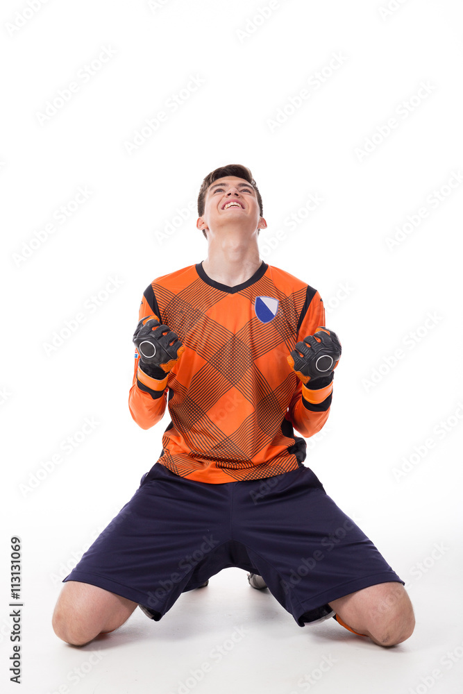 Football player celebrating a goal isolated in white Football player celebrating a goal isolated in white