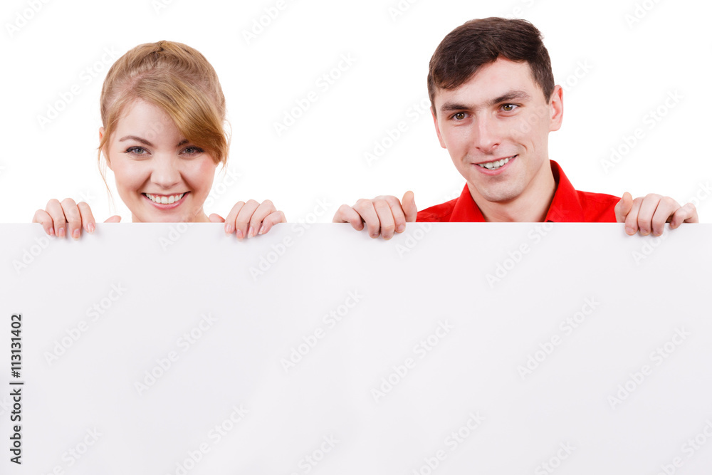 Couple with blank presentation board banner sign Couple with blank presentation board banner sign