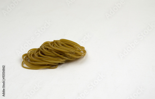 Pile of rubber bands on a white background