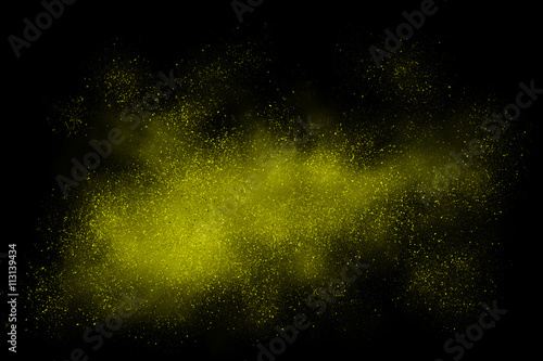 Yellow abstract powder explosion on a black background © Christopher Hall