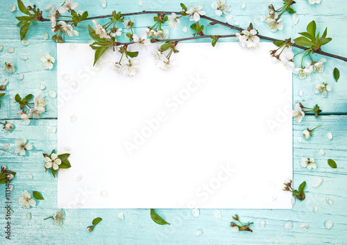 Delicate frame with flowers of cherry