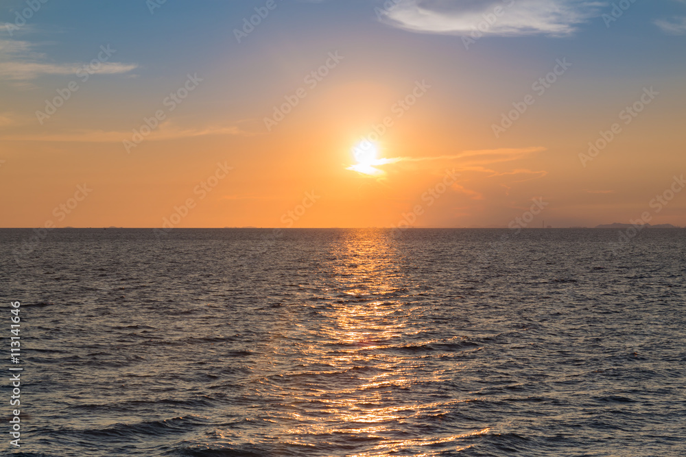 Sunset over seacoast skyline, natural landscape background