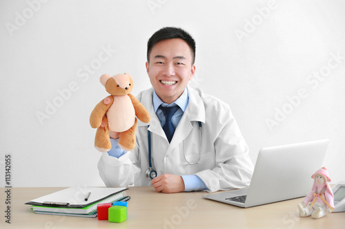 Handsome pediatrician docto...