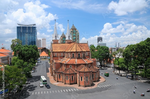 Saigon Notre-Dame Cathedral Basilica (Basilica of Our Lady of The Immaculate Conception) on blue sky background in Ho Chi Minh city, Vietnam. Ho Chi Minh is a popular tourist destination of Asia.