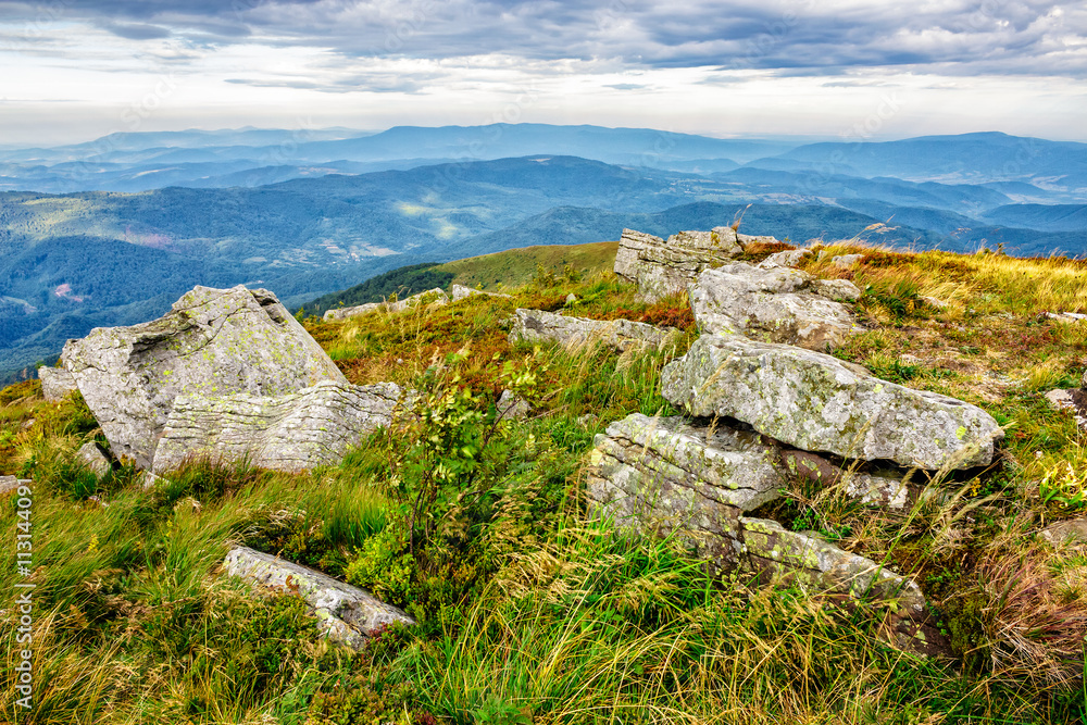 stones in valley on the edge of mountain range