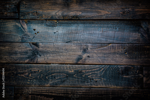 Rustic wooden table background top view..