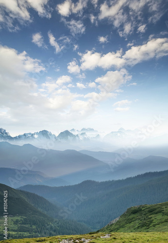 Obraz na płótnie Hills during sunrise in mountain valley. Beautisul natural landscape w salonie