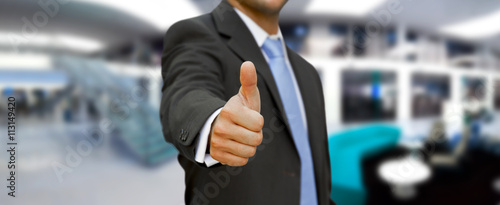 Tableau sur toile Businessman Thumbs up