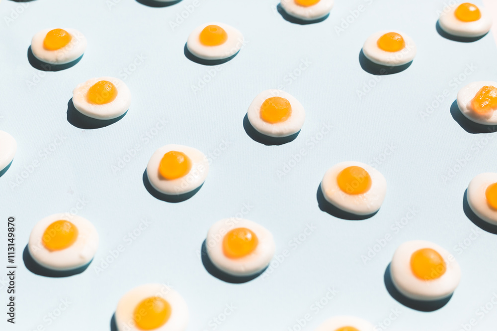 contemporary still life of a group fried eggs candy, colorful pop concept contemporary still life of a group fried eggs candy, colorful pop concept