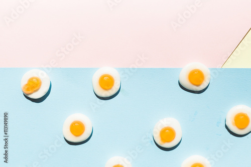 contemporary still life of a group fried eggs candy  colorful pop style