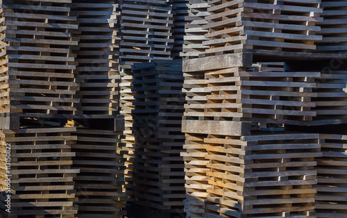 Oak planks for wine barrels stacked in piles elution of tannins on the open air  