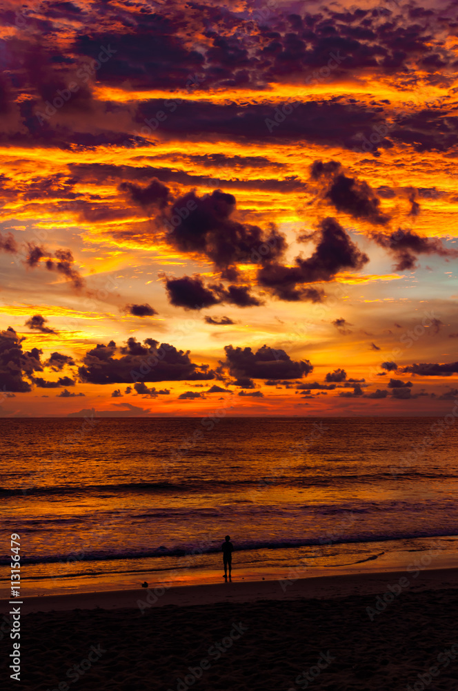 Golden twilight time after sunset in front of beach at Phuket, T Golden twilight time after sunset in front of beach at Phuket, T