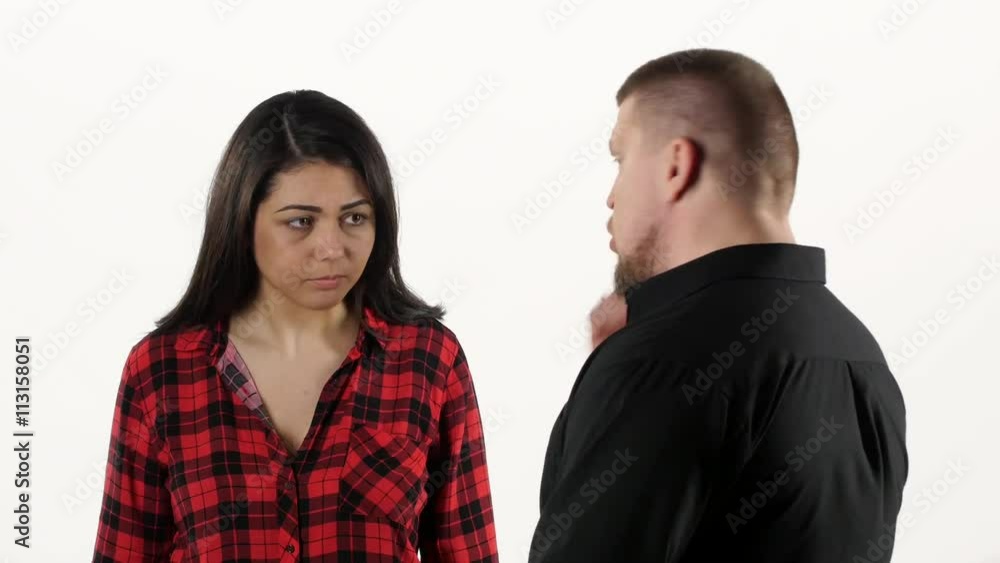 Angry man screaming and threatening to hit woman. White Angry man screaming and threatening to hit woman. White